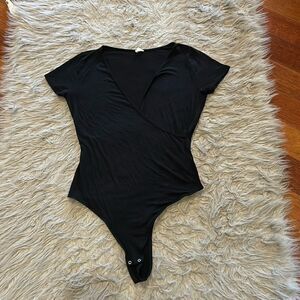 Garage black soft rayon stretch wrap front short sleeve bodysuit